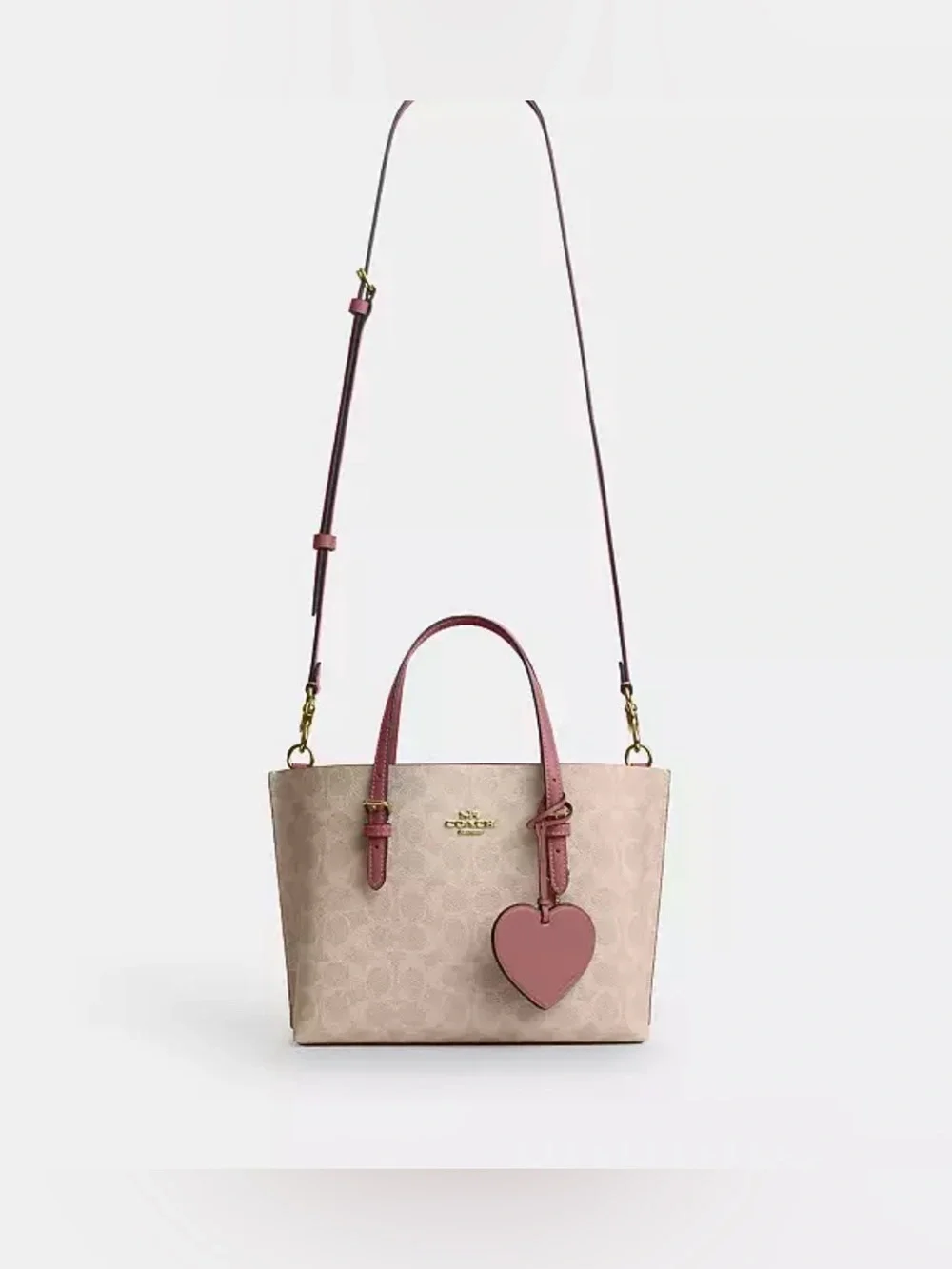 Coach Mollie Tote Bag 25 In Signature Canvas With Heart Charm. New no tag